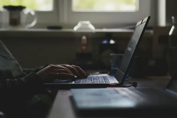A desk set up for editing by the window
